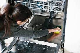How to pull out a dishwasher to clean behind it